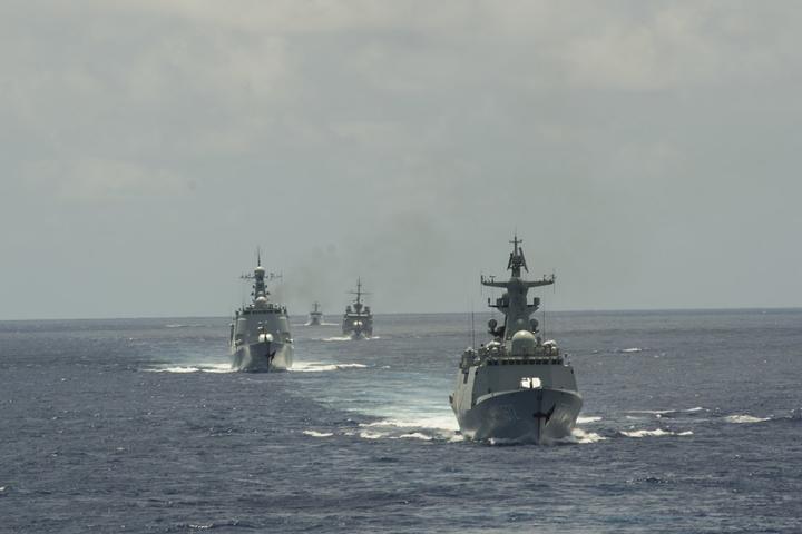 Chinese and Indonesian Navy warships among four vessels in formation at RIMPAC in the Pacific Ocean in July 2016.